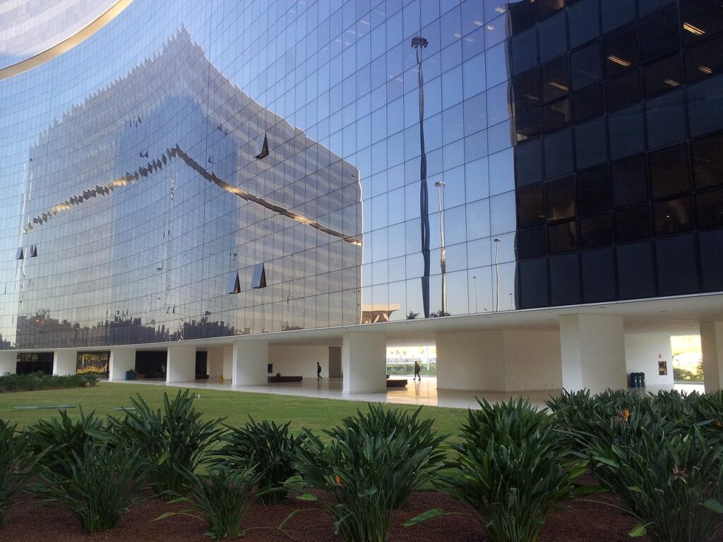 building, windows, glass, reflection, urban, city, exterior, contemporary, facade, futuristic, skyscraper, corporate, architecture, company, workplace